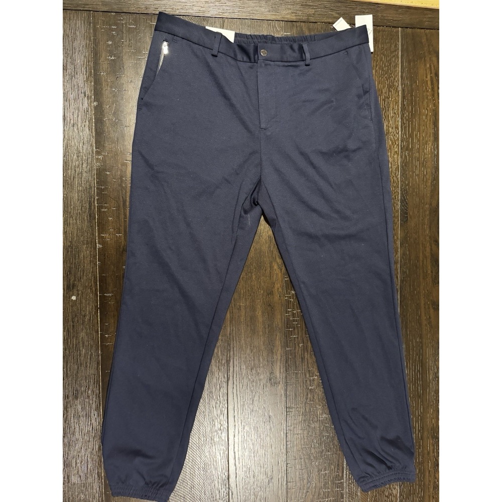NWT Calvin Klein Men's Slim Fit Sport Tech Jogger Pants Blue 36x32 Zipper Pocket